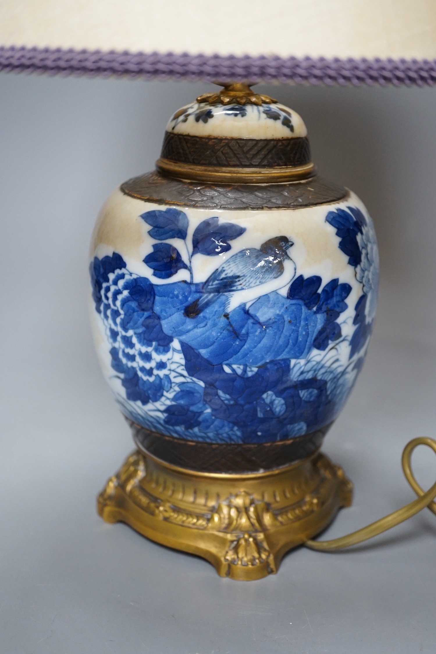 A late 19th century Chinese blue and white crackle glaze jar, now mounted as a lamp, total height 38cm